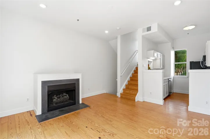 Inviting living area featuring a fireplace