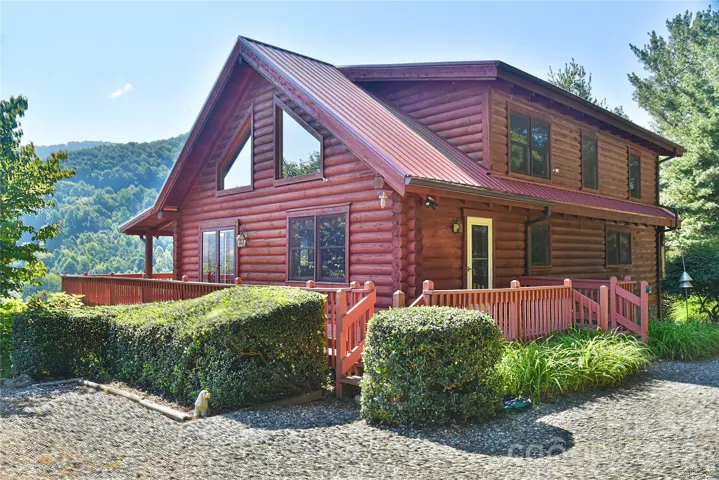 27 Winn Drive, a beautiful log home in the country!