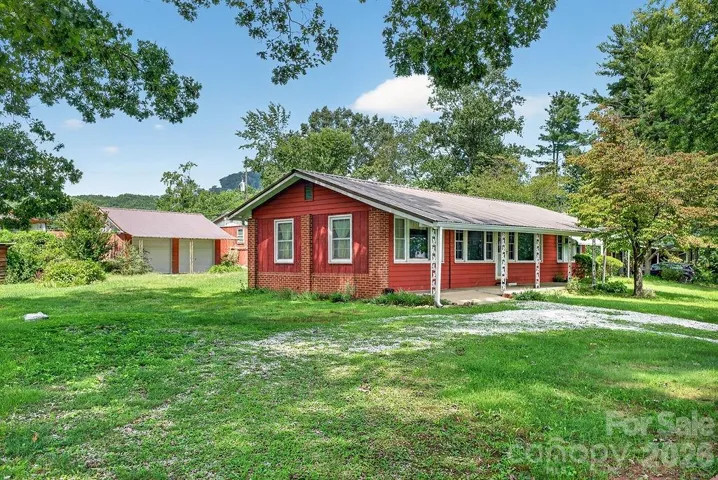 2 bedroom cottage with detached 2 car garage in the back.