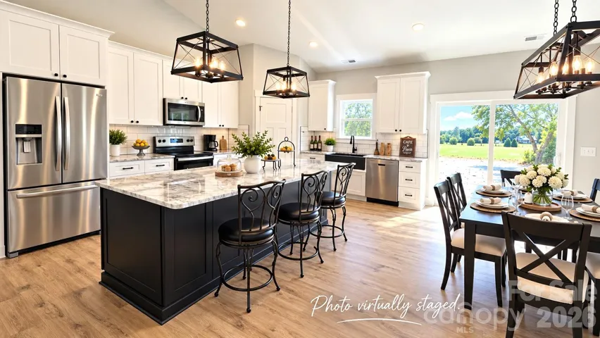 Dream gourmet Kitchen with huge 9 ft island & walk in pantry. (Refrigerator is virtually added & is not included. The stove, dishwasher & microwave are included.)