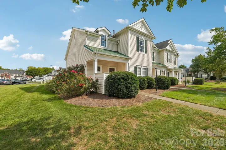 Welcome home to this beautifully maintained end-unit townhome