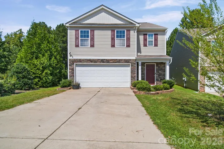 Front of house with driveway
