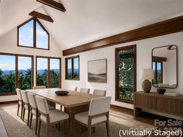 Lovely dining room with vaulted ceiling - virtually staged.