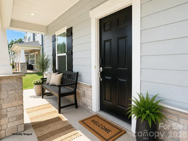 Relaxing Covered Front Porch, Custom Brick Veneer.