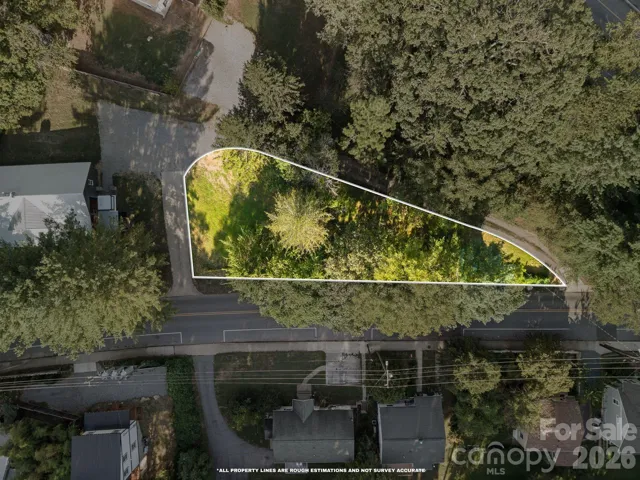 Rare opportunity to own a level, buildable lot in the heart of West Asheville.