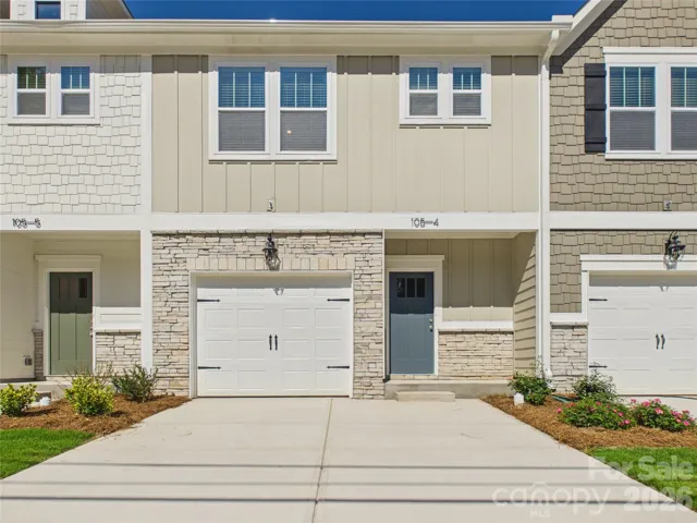 1 car garage with 2 car parking pad