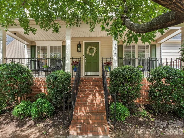 Welcome to 15606 Troubadour Lane. Take in the beauty of the great outdoors, and wave to your neighbors, from the comfort of your full length, covered front porch.
