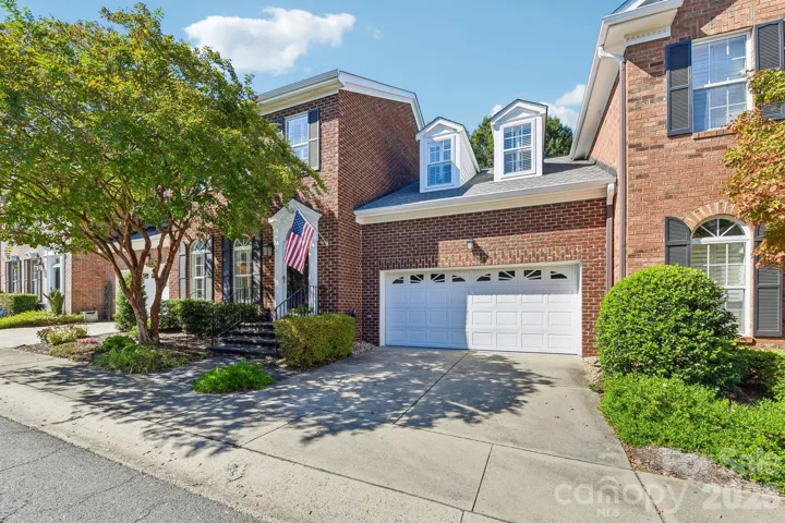 Handsome all brick townhome in pristine perfect condition w/upgrades!