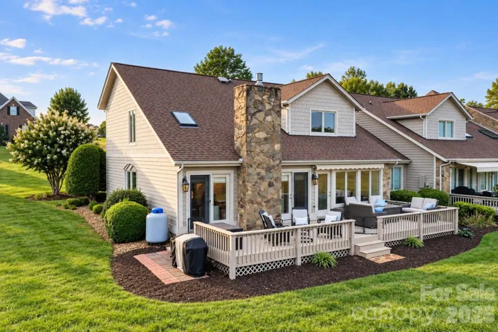 Renovated End Unit with direct pond views.