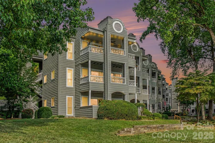 End unit condo with large balcony offering privacy with water and harbor views.