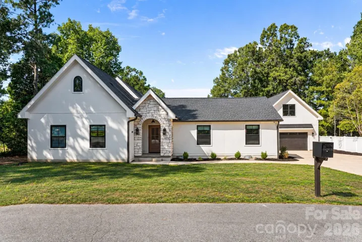 Completely reimagined in 2025 sitting on .51 acres