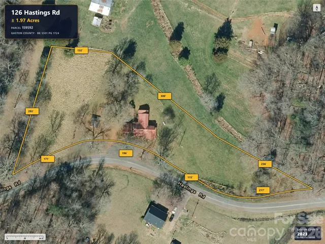 Aerial imagery predates removal of the previous home.