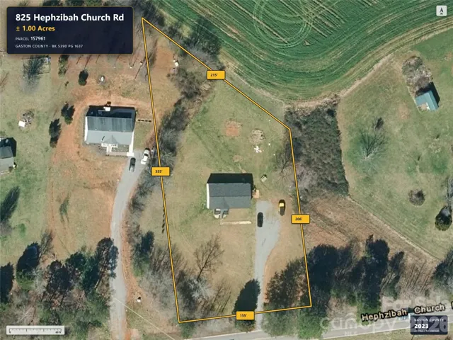 Aerial imagery predates removal of the previous home.