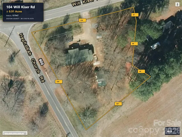 Aerial imagery predates removal of the previous home.
