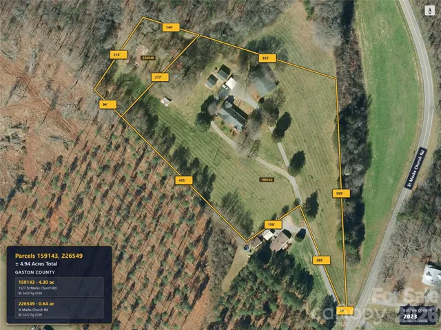 Aerial imagery predates removal of the previous home.