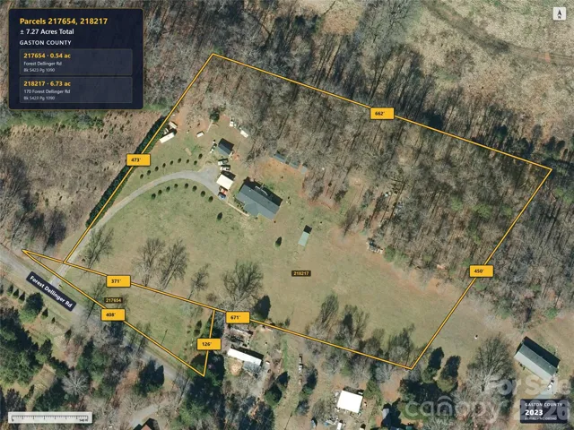 Aerial imagery predates removal of the previous home.