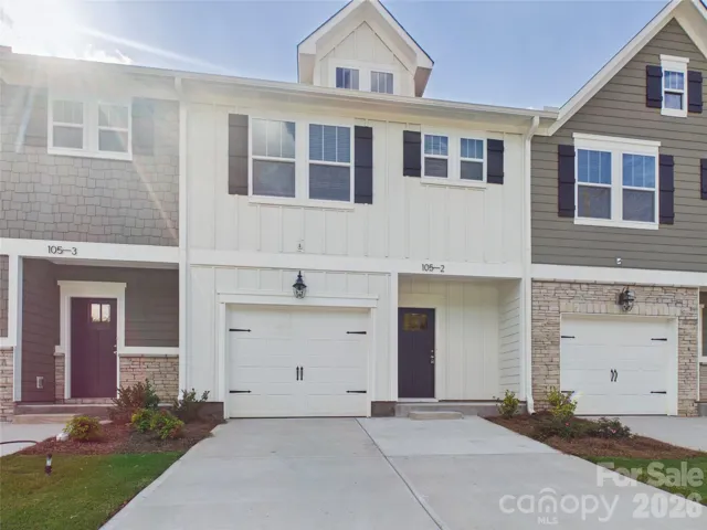 1 car garage with 2 car parking pad