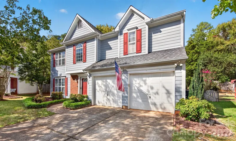 Welcome home to 7609 Berrywood Circle in popular Huntersville!