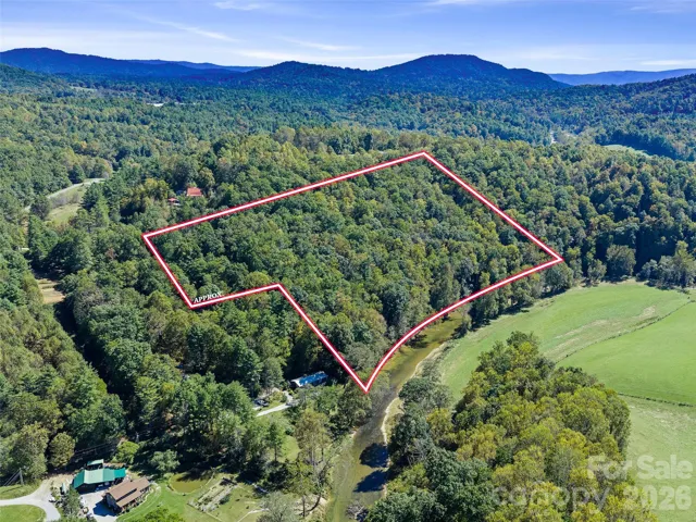 13+ acre parcel with almost 900' frontage on the North Toe River!