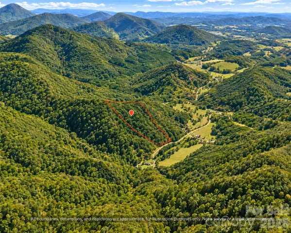Aerial of the rolling Brushy Mountain foothills around this 9-acre wooded tract near Taylorsville, NC