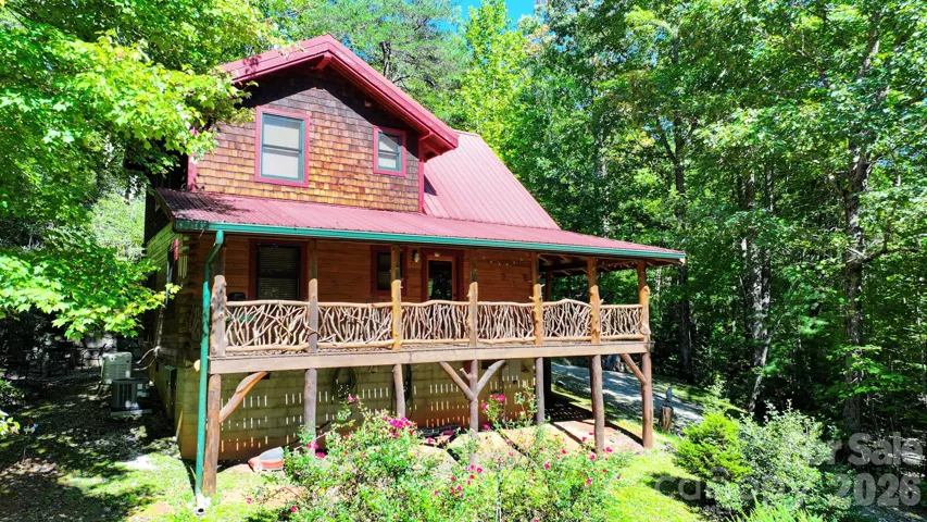 171 Camp Elliot Rd, custom 1080 sq ft log home w 2 bed 2 full bath on 5.67 acres