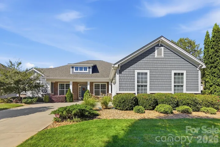 Elegant and open ranch on great corner home site just blocks from Lake Wylie and fabulous resort amenities of The Vineyards