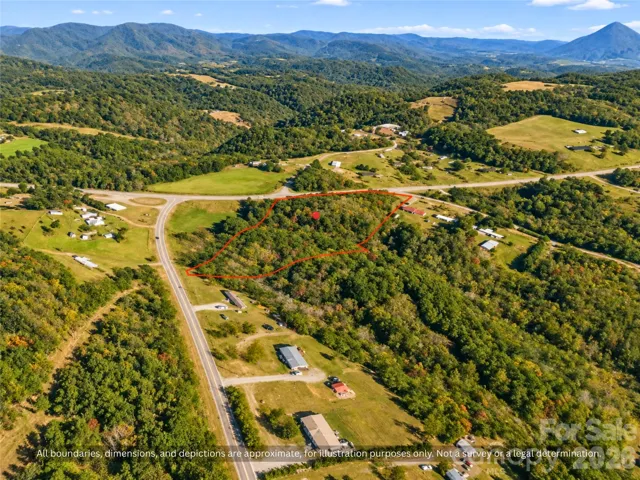 Aerial: 3.3 Wooded Acres Near Casar NC. Aerial view of about 3.3 wooded acres for sale in Cleveland County, NC, on paved NC Highway 10 near Casar, with the South Mountains in the distance. County water at the road. Homesite for a site-built, modular or manufactured home. Lines approximate.