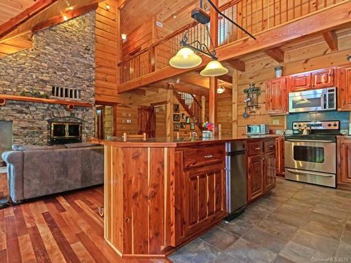 Kitchen with granite tile countertops