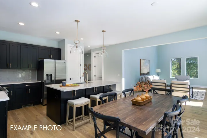 Example photo. Open floor plan is perfect for entertaining.
