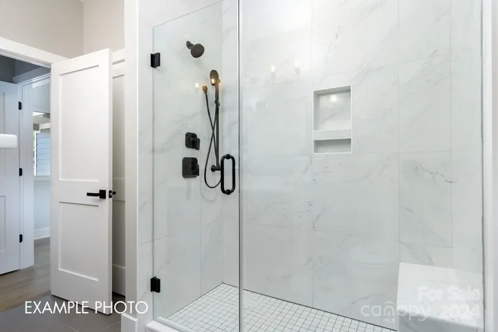 Example photo. Create your dream bathroom with a luxurious, custom walk-in shower.