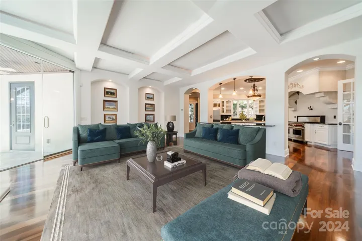 Main house: Panoramic views of the pool & patio from the kitchen & Family Room. All freshly painted. (Virtually staged.)