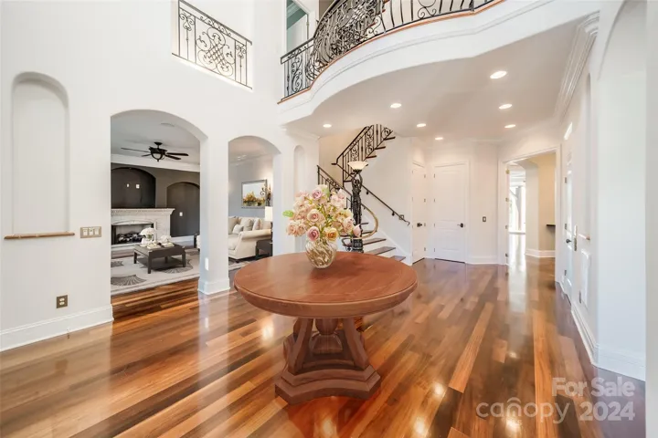 Grand foyer double iron door entrance. Details, details, details! 3 floor elevator to the right in photo.