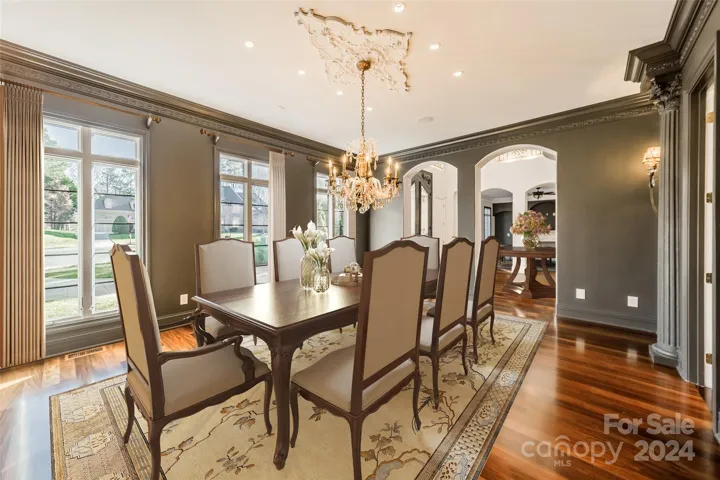 Spacious Dining Room for friends and family. Gas fireplace creates luxurious ambiance. Freshly painted. (Virtually staged.)