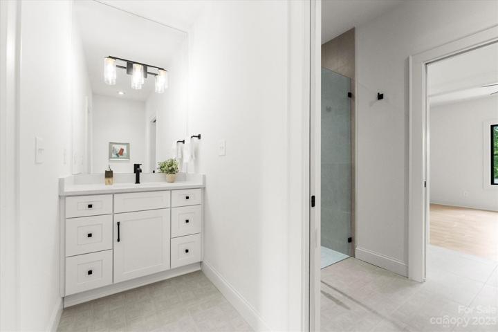 guest bath - with two sinks and two toilets