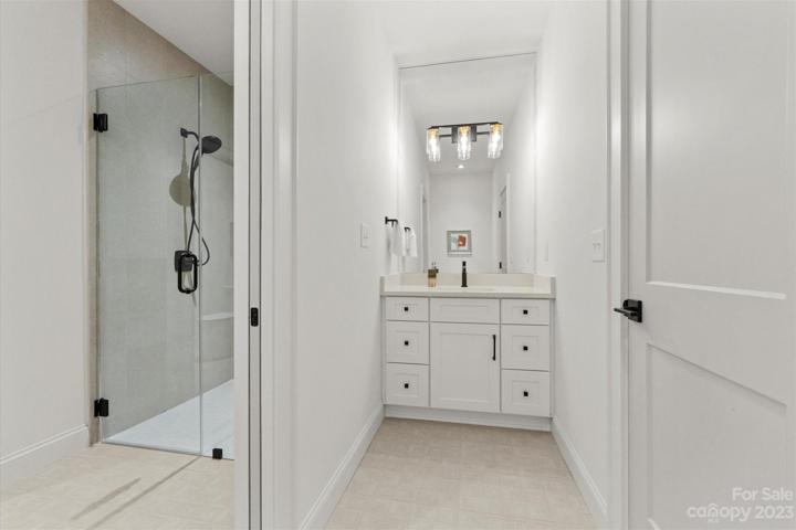 guest bath - with two sinks and two toilets