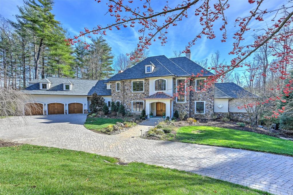 Beautiful setting with remodeled front entrance,copper roof and gutters.
