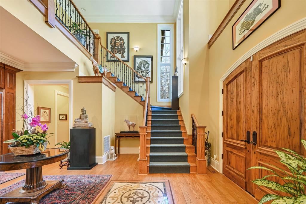 Main staircase. Front doors are wormy chestnut.