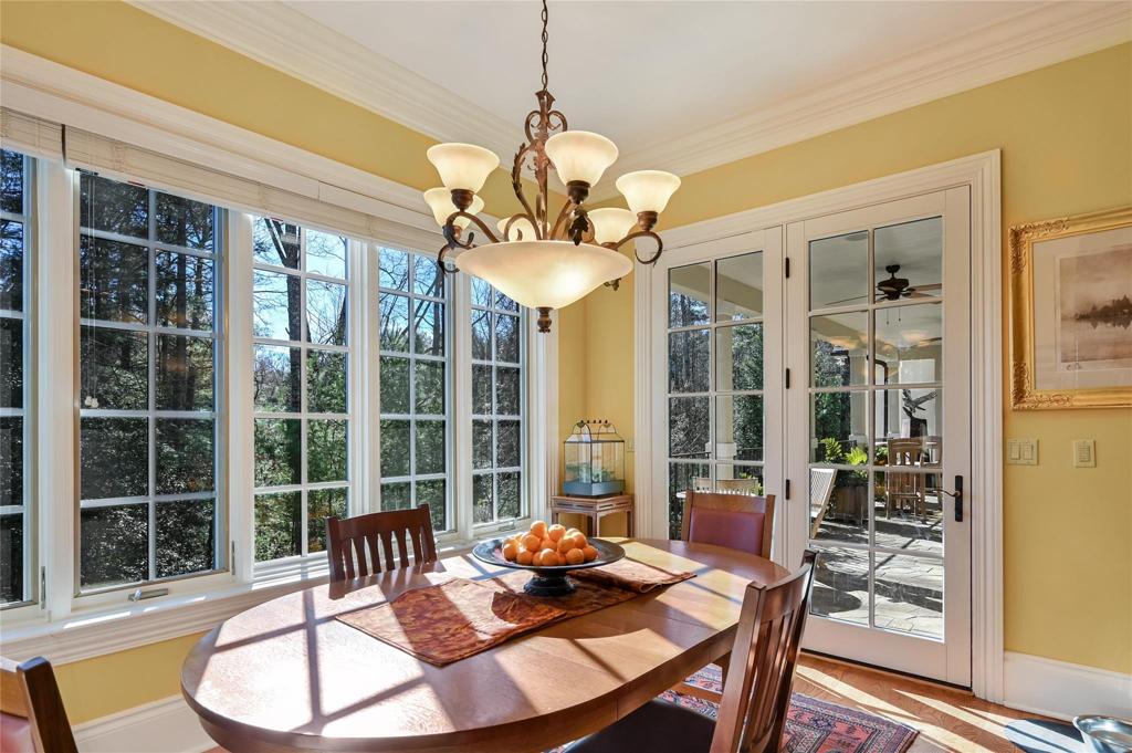 Breakfast area open to den and entrance to  patio