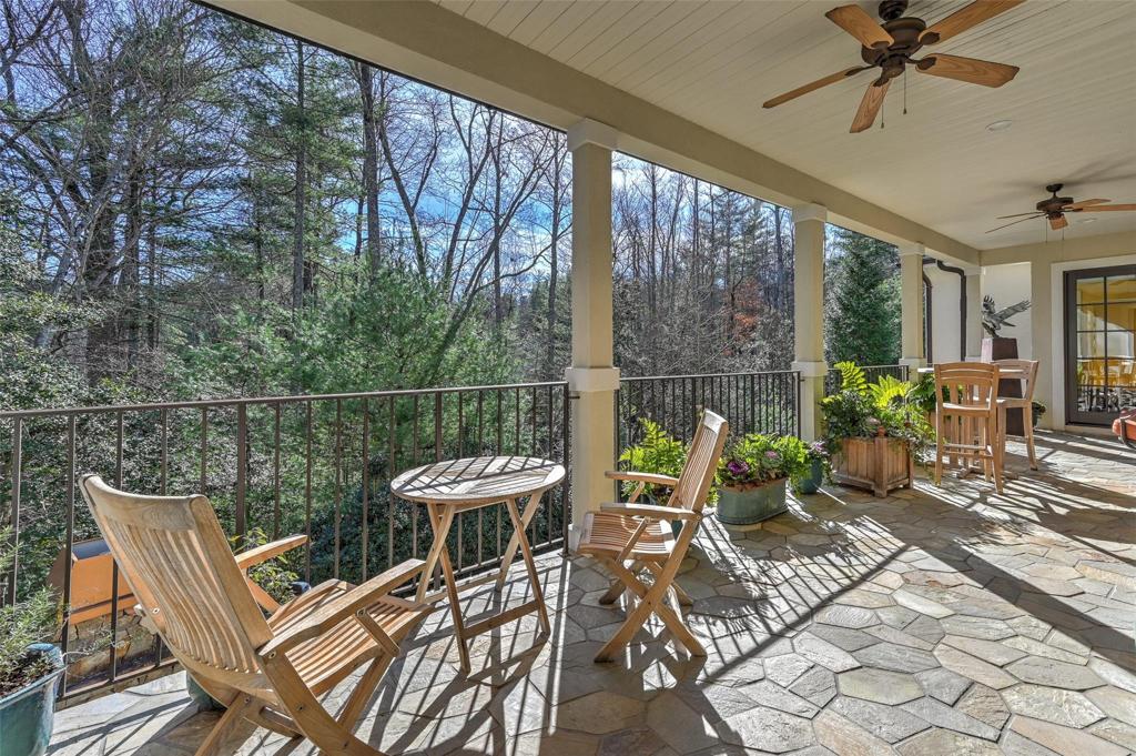 Large covered main level patio with entrance to the breakfast room