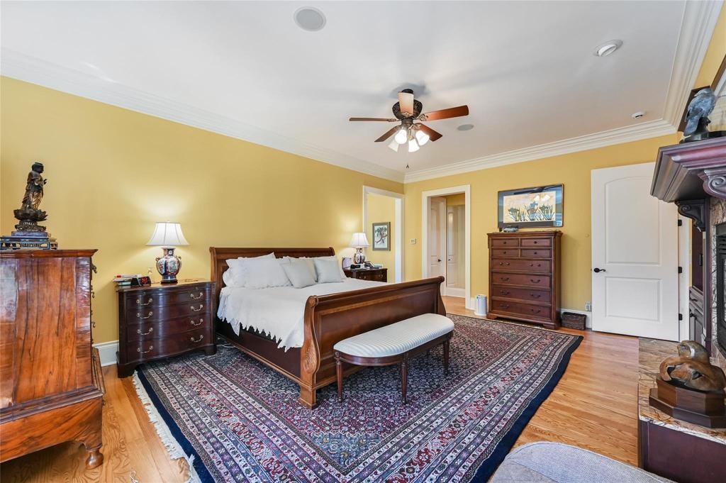 Primary bedroom with two walk-in closets on main level
