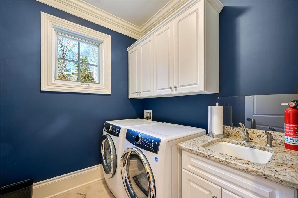 Laundry room on second floor with newer washer/dryer