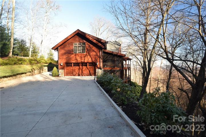 Driveway to the double garage and around to the front under the porte cochere