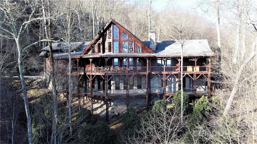 Drone photo of the rear with upper and lower covered decks