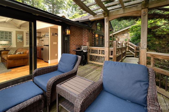 Suite has charming pergola and stunning views from deck and living room