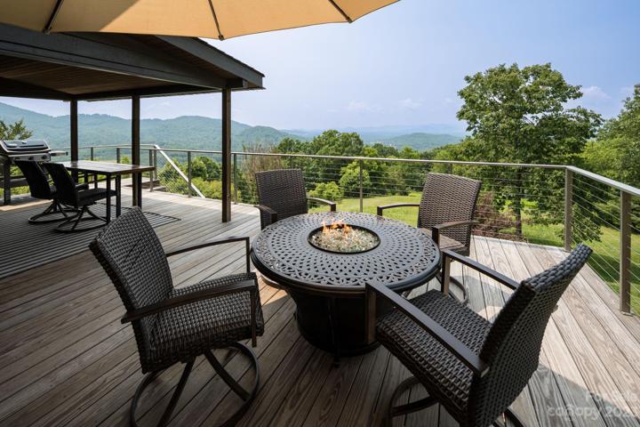 Spacious deck is perfect for entertaining or relaxing during the sunset views