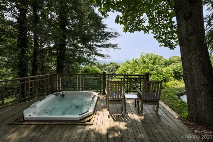 Take in city and mountain views from the deck and hot tub