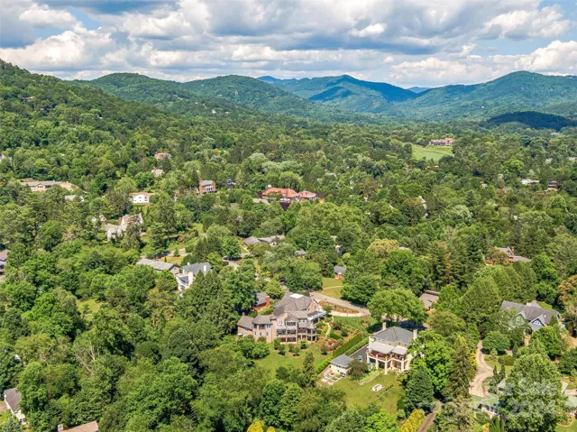 In the bottom center you'll note the innumerable al fresco options in this home and you can also see how close the renowned Omni Grove Park Inn golf course is - as a portion of the greens may be seen in the upper right hand side of this aerial photo