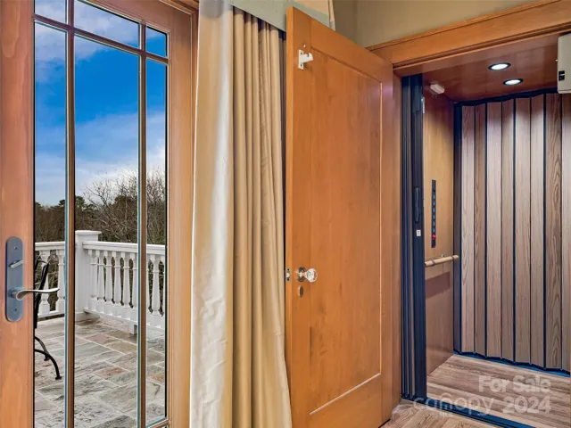 The elevator services all the levels of this home.