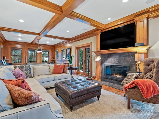 Cozy. Comfortable. Convivial. Truly a Great Room. Those glass French doors lead you to...