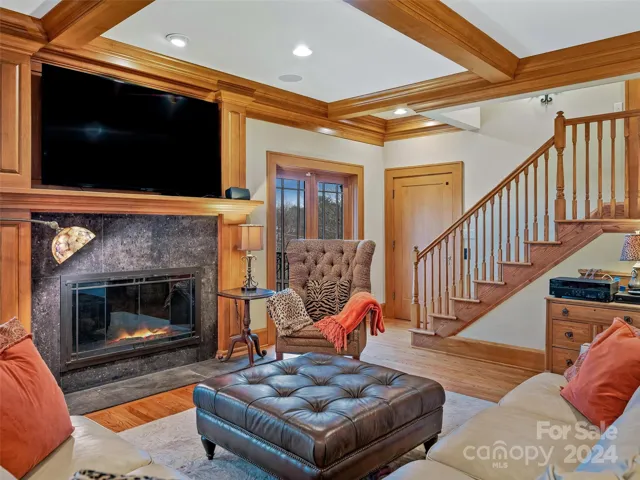 Access to the private office is either up those stairs or through that wood door - which leads to the elevator.